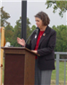 Woman speaking during the dedication