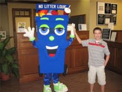 Child high fives No Litter Louie mascot